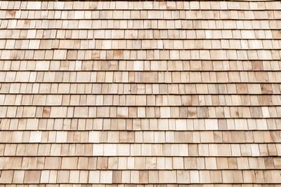 Several wood cedar shingles for siding or roofs